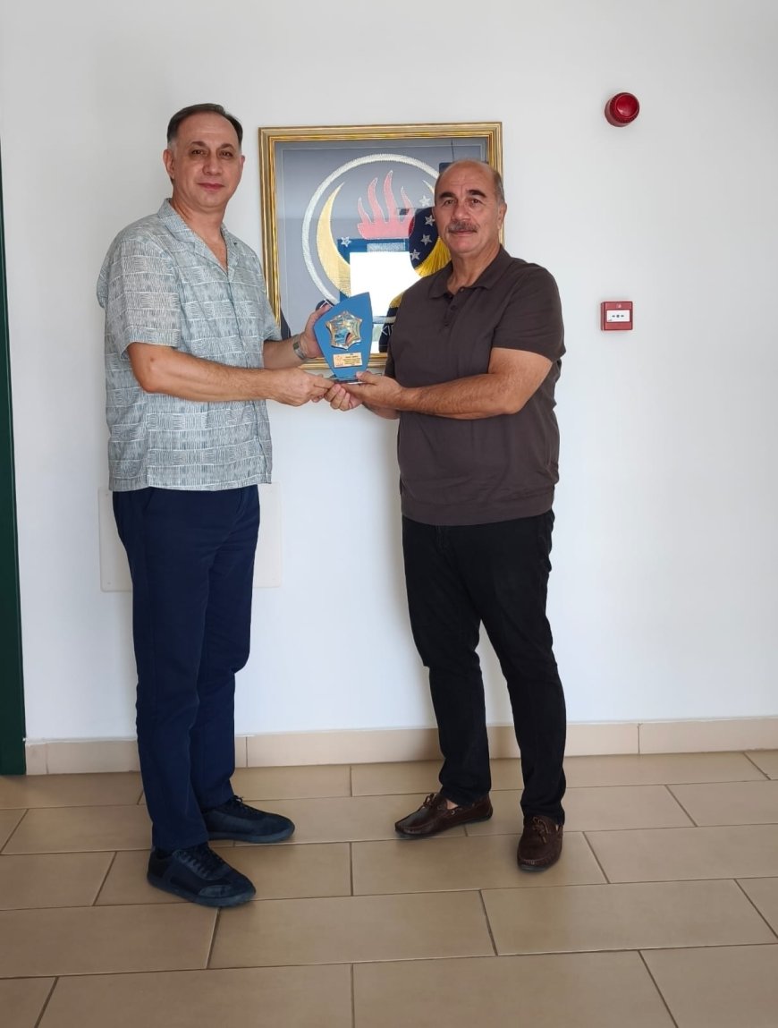 Nasıroğlu’ndan Gündoğdu’ya plaket